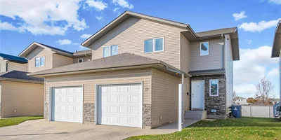 515 Centennial Boulevard #12, Warman, SK – Stylish 3-Bedroom Townhome Backing Green Space